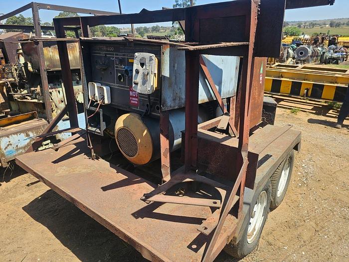 Used GENERATOR & POWERWELD 400 WELDER WITH 25 KW HATZ 3 CYLINDER ENGINE ON TRAILER