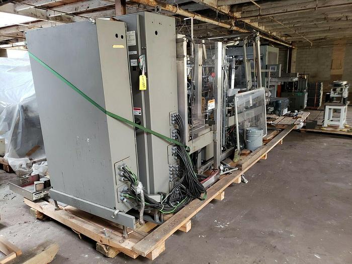 Used Douglas Axiom Wrap around case packer for Sale at ND Industrial