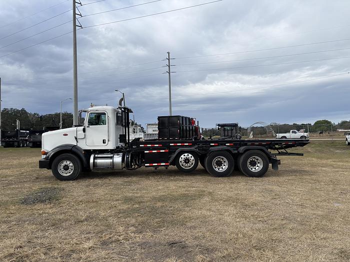 Used 2012 Peterbilt 365 Tri-Axle Roll-Off Truck