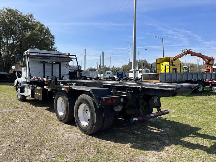Used 2013 Volvo VHD Tandem-Axle Roll-Off Truck #5561