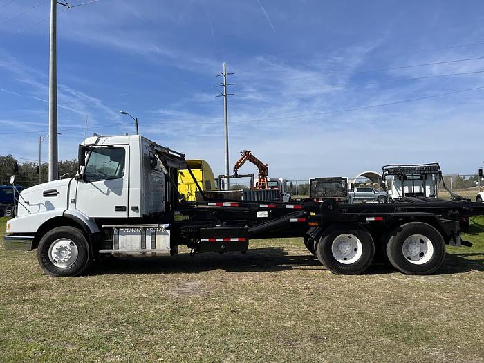 Used 2013 Volvo VHD Tandem-Axle Roll-Off Truck #5561