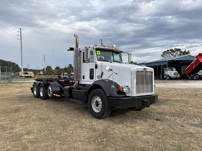 Used 2012 Peterbilt 365 Tri-Axle Roll-Off Truck