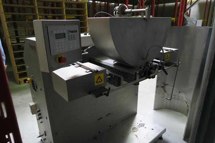 Used Hacos Depositor for chocolate or cream centres