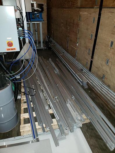 Used EQUIPMENT EXPRESS BOTTLING LINE (FILLER AND CAPPER)