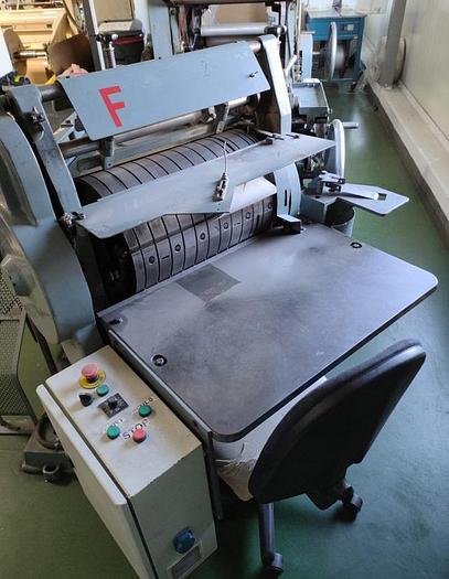 Used (visible in production) WINDMÖLLER & HÖLSCHER (W&H) Turners - triangle bag making machine