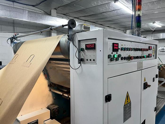 Used (visible in production) 1995 CURIONI SUN MASTER 540 - Reel fed Square bottom paper bag making machine with in line twisted handle unit