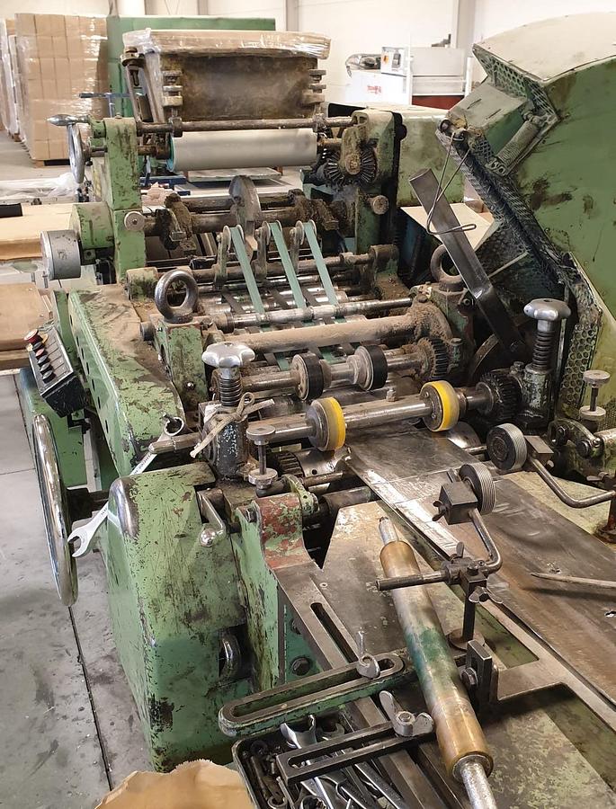 Used (visible in production) Fischer and Kecke Maxima 31 + WH QMS 992  flexo printer ( Flat & Satchel bag machine )