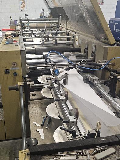 Used (visible in production) 2001 CURIONI SUN MASTER 540 - square bottom paper bag making machine with twisted handles unit