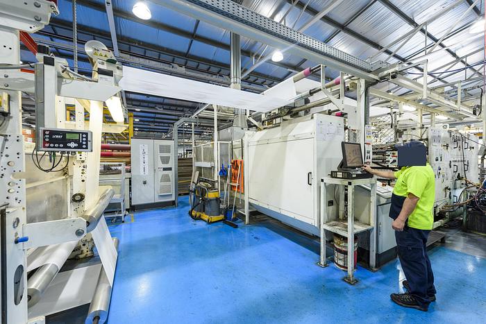 Used (visible in production) 2012 W&H FLEXA (reel-to-reel) 4 col. Stack flexo with FILMATIC® S Mono-Winder & Unwind unit (1570 mm)