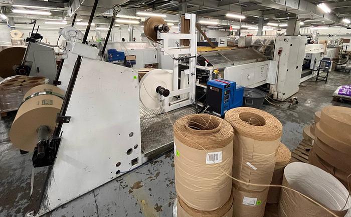 Used (visible in production) 1996 CURIONI SUN MASTER 540 Reel fed Square bottom paper bag making machine with in line twisted handle unit