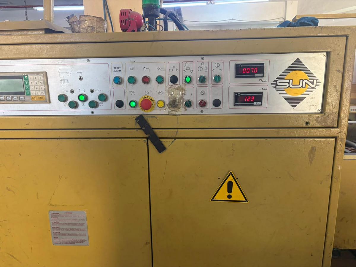 Used (visible in production) 2001 CURIONI SUN MASTER 540 - square bottom paper bag making machine with twisted handles unit