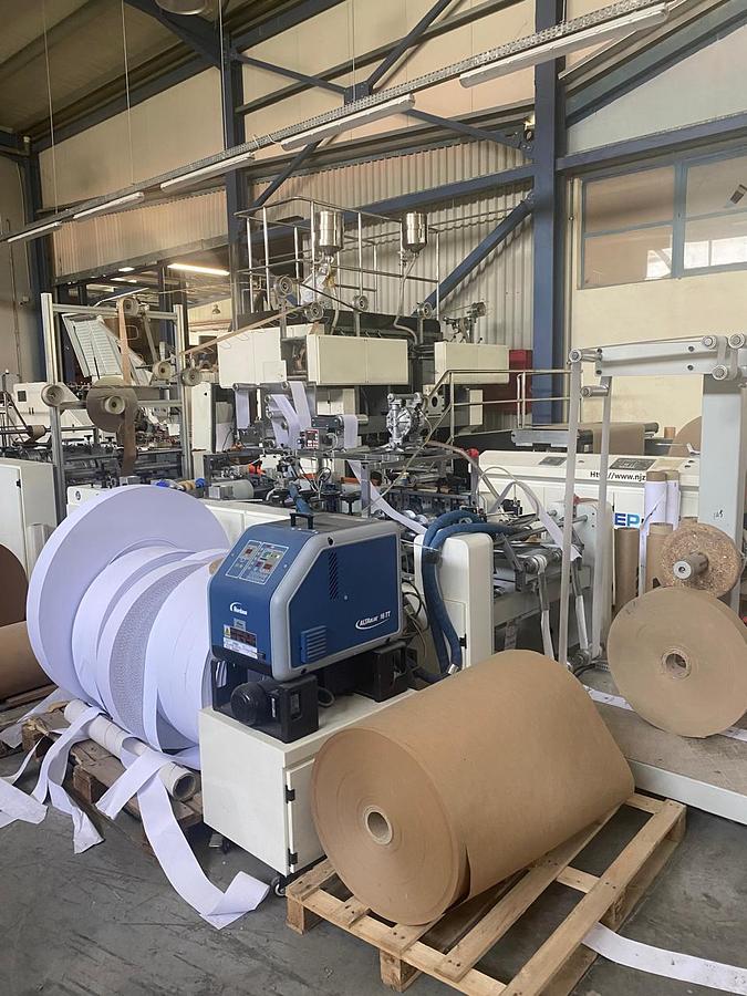 Used (visible in production) 2023 ZNEP ZD-F450Q |  Automatic TWISTED & FLAT handles shopping bag making machine (2 handles unit)