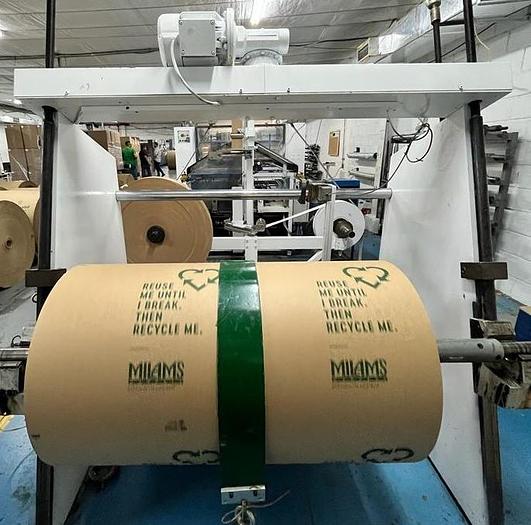 Used (visible in production) 1995 CURIONI SUN MASTER 540 - Reel fed Square bottom paper bag making machine with in line twisted handle unit