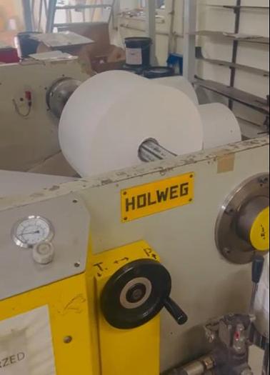 Used (visible in production) 2005 Holweg RS26 with in line 4 col. flexo & window device