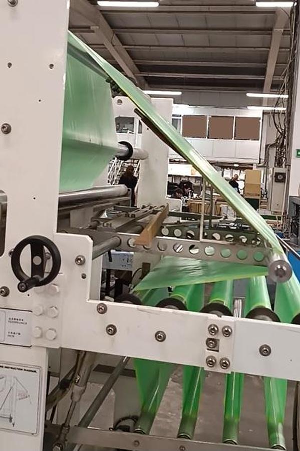Used (visible in production) 2012 HEMINGSTONE HM-1250MSR+IL - Machine for drawtape garbage bag on roll, flat bottom; side seal.