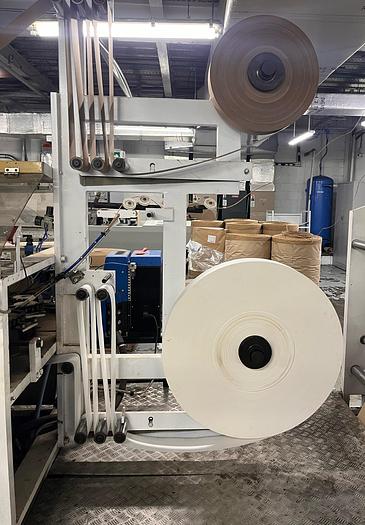 Used (visible in production) 1996 CURIONI SUN MASTER 540 Reel fed Square bottom paper bag making machine with in line twisted handle unit