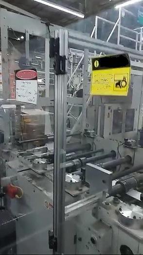 Used (visible in production) 2013 HOLWEG WEBER 5XF - Roll fed square bottom paper bag malking machine with TWISTED handles unit
