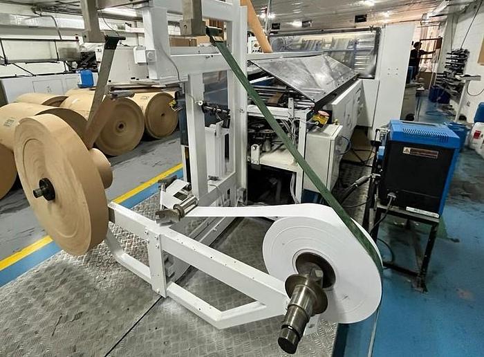 Used (visible in production) 1995 CURIONI SUN MASTER 540 - Reel fed Square bottom paper bag making machine with in line twisted handle unit
