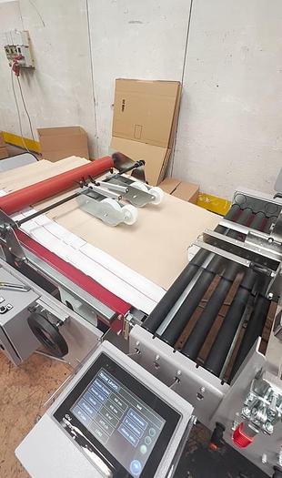 Used (visible in production) 2022 PETRATTO METRO SE 78 folding/gluing machine model  for premium e-commerce paper envelopes, with double adhesive strip