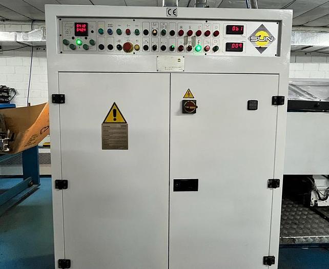 Used (visible in production) 1995 CURIONI SUN MASTER 540 - Reel fed Square bottom paper bag making machine with in line twisted handle unit