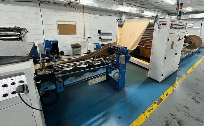 Used (visible in production) 1995 CURIONI SUN MASTER 540 - Reel fed Square bottom paper bag making machine with in line twisted handle unit