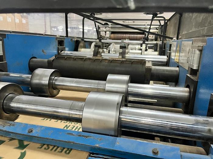 Used (visible in production) 1995 CURIONI SUN MASTER 540 - Reel fed Square bottom paper bag making machine with in line twisted handle unit