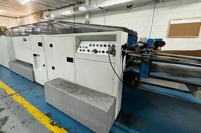 Used (visible in production) 1995 CURIONI SUN MASTER 540 - Reel fed Square bottom paper bag making machine with in line twisted handle unit