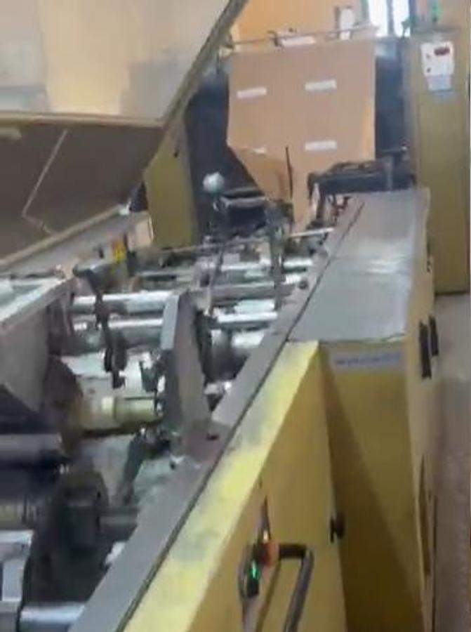 Used (visible in production) 2001 CURIONI SUN MASTER 540 - square bottom paper bag making machine with twisted handles unit
