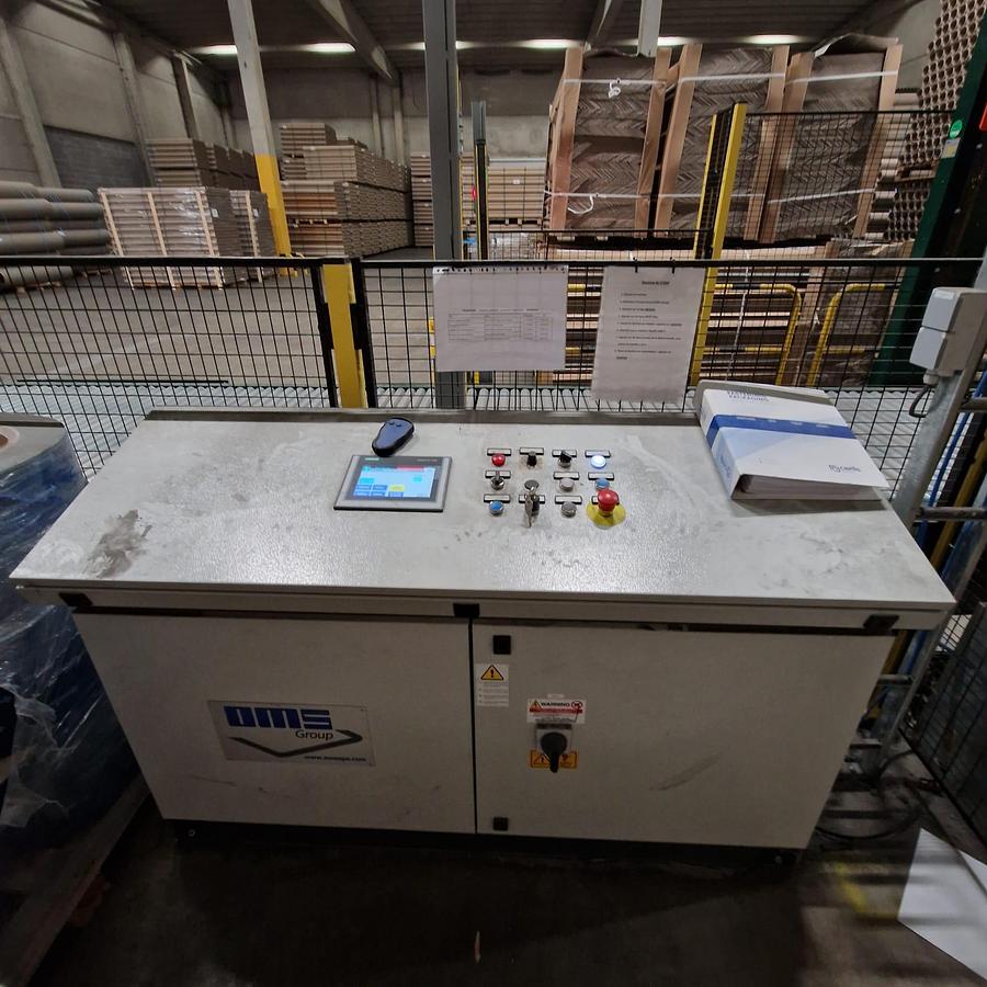 Used (assembled but no longer visible in production) 2019 Vertical strapping machine from OMS type 08RP with TR1400 strapping head