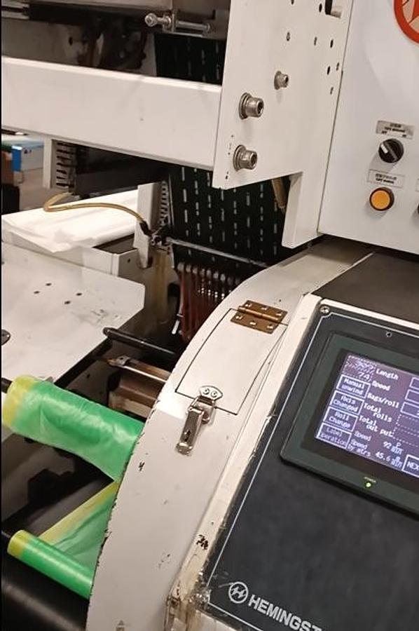Used (visible in production) 2012 HEMINGSTONE HM-1250MSR+IL - Machine for drawtape garbage bag on roll, flat bottom; side seal.