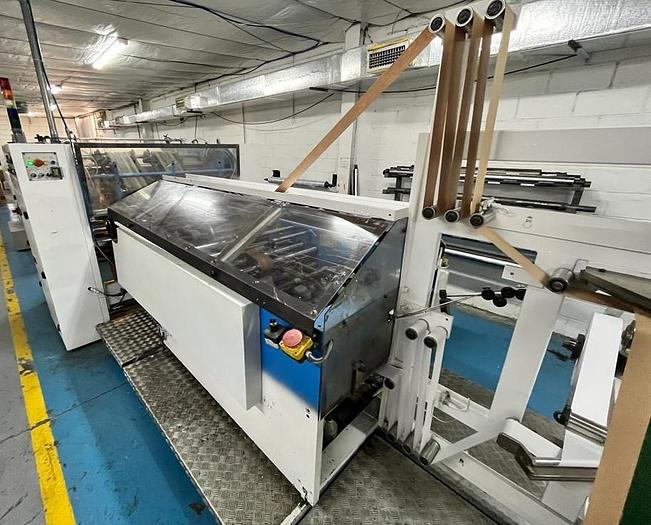 Used (visible in production) 1995 CURIONI SUN MASTER 540 - Reel fed Square bottom paper bag making machine with in line twisted handle unit
