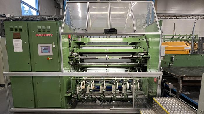 Used (visible in production) 2000 Dusenbery Europe Ltd. slitter rewinder mod. 375