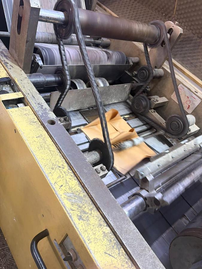 Used (visible in production) 2001 CURIONI SUN MASTER 540 - square bottom paper bag making machine with twisted handles unit