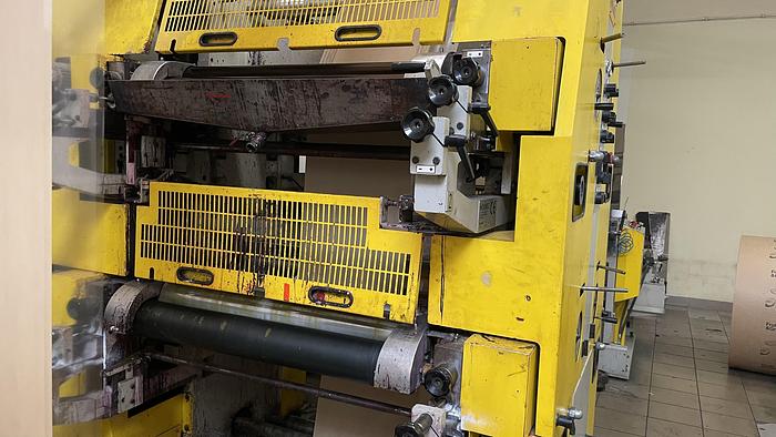 Used (visible in production) 2005 Holweg RS26 with in line 4 col. flexo & window device