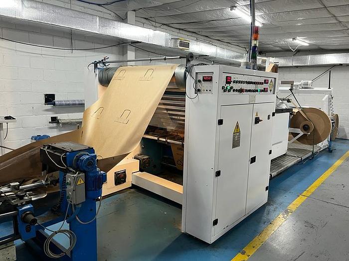 Used (visible in production) 1995 CURIONI SUN MASTER 540 - Reel fed Square bottom paper bag making machine with in line twisted handle unit