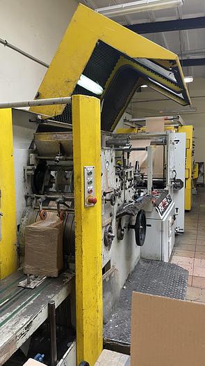 Used (visible in production) 2005 Holweg RS26 with in line 4 col. flexo & window device