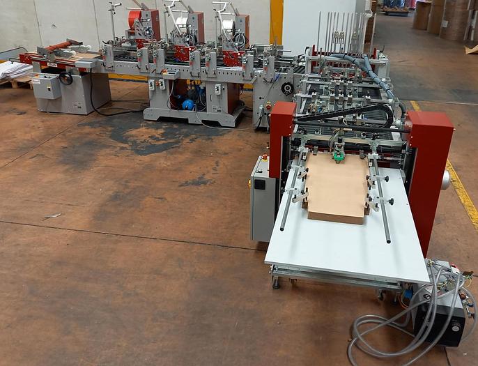 Used (visible in production) 2022 PETRATTO METRO SE 78 folding/gluing machine model  for premium e-commerce paper envelopes, with double adhesive strip