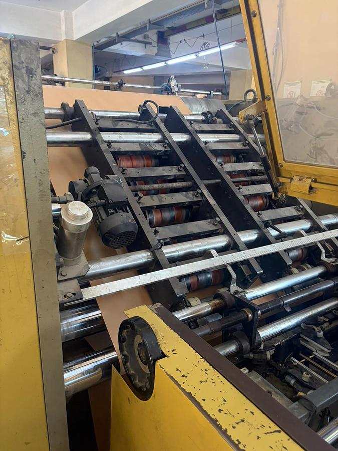 Used (visible in production) 2001 CURIONI SUN MASTER 540 - square bottom paper bag making machine with twisted handles unit