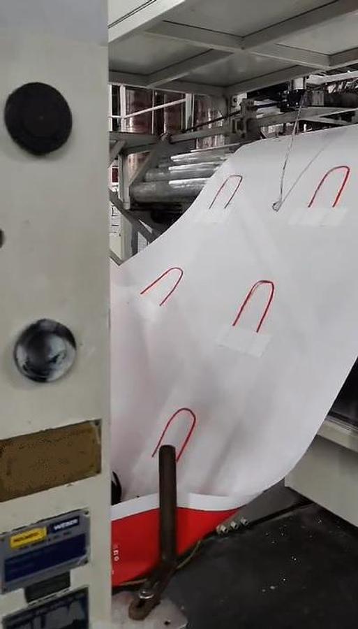 Used (visible in production) 2013 HOLWEG WEBER 5XF - Roll fed square bottom paper bag malking machine with TWISTED handles unit