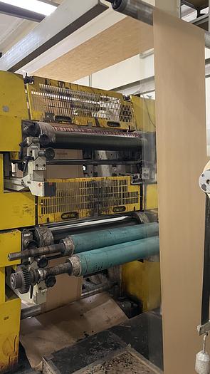 Used (visible in production) 2005 Holweg RS26 with in line 4 col. flexo & window device