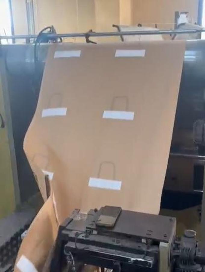 Used (visible in production) 2001 CURIONI SUN MASTER 540 - square bottom paper bag making machine with twisted handles unit