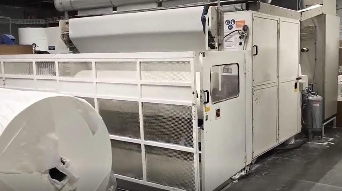Used (visible in production) 1999 FABIO PERINI 702G slitter rewinder + 2003 MACDUE packaging line | for production and packaging of tissue rolls