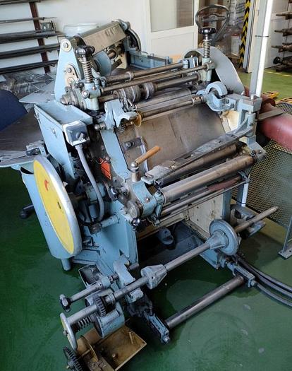 Used (visible in production) WINDMÖLLER & HÖLSCHER (W&H) Turners - triangle bag making machine