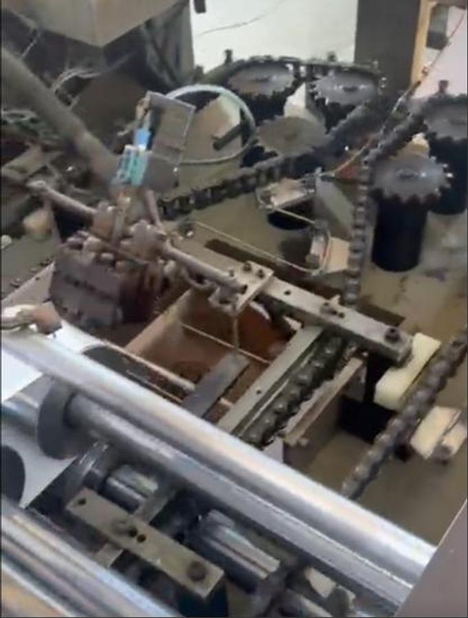 Used (visible in production) 2001 CURIONI SUN MASTER 540 - square bottom paper bag making machine with twisted handles unit