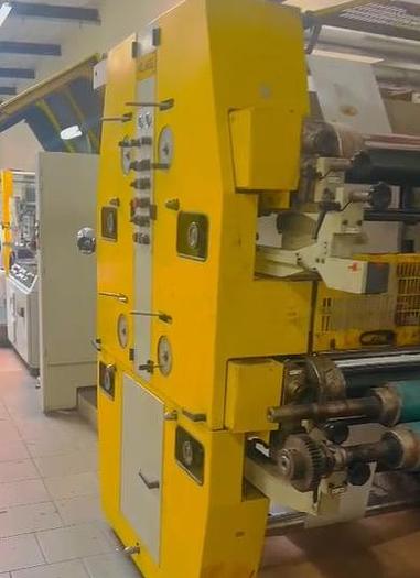 Used (visible in production) 2005 Holweg RS26 with in line 4 col. flexo & window device