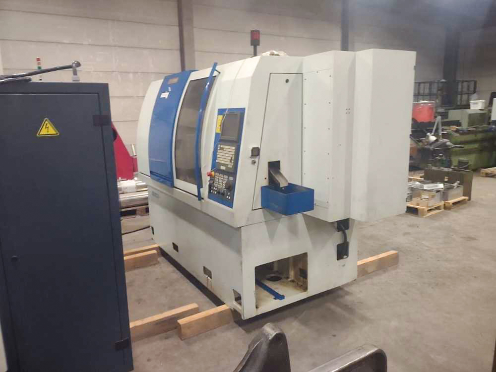 Used Manurhin KMX Swing - CNC Lathe - 2004