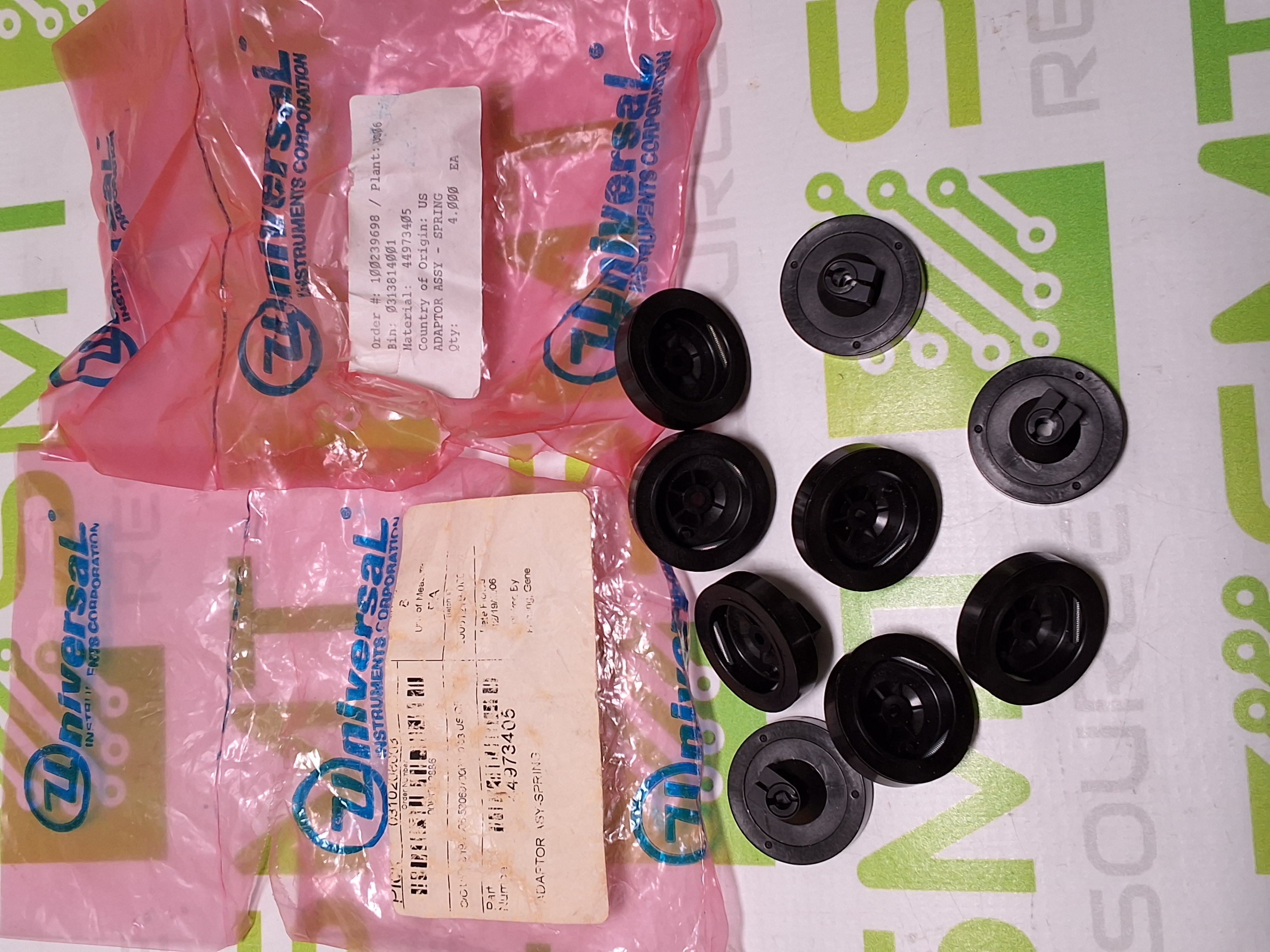 UNIVERSAL INSTRUMENTS 44973405 SPRING ADAPTOR ASSEMBLY 44973404 REV B - BRAND NEW