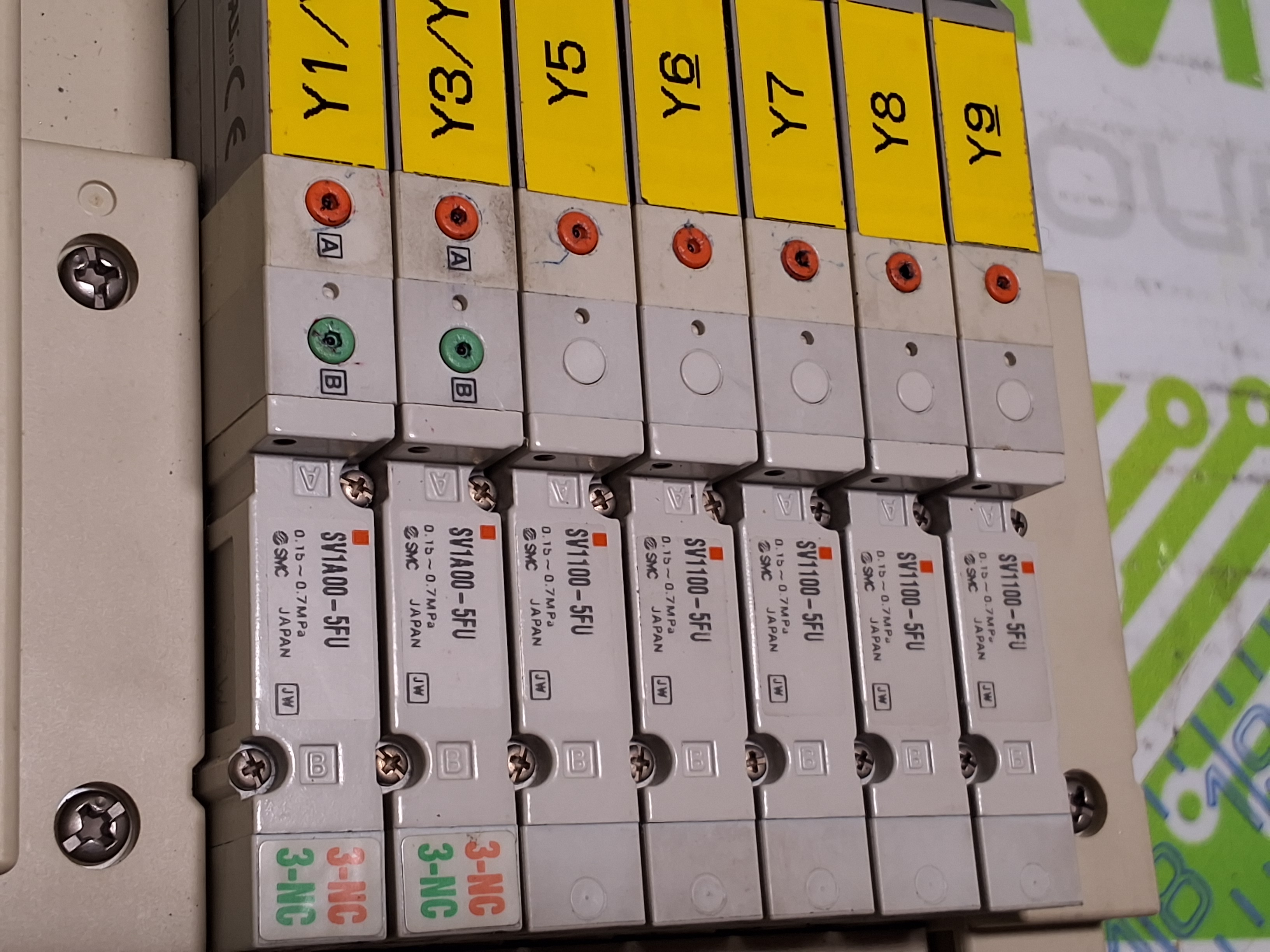 Used SMC EX120-SCA1 CONTROLLER AND 5 PORT MANIFOLD WITH 7 SMC SOLENOID VALVES