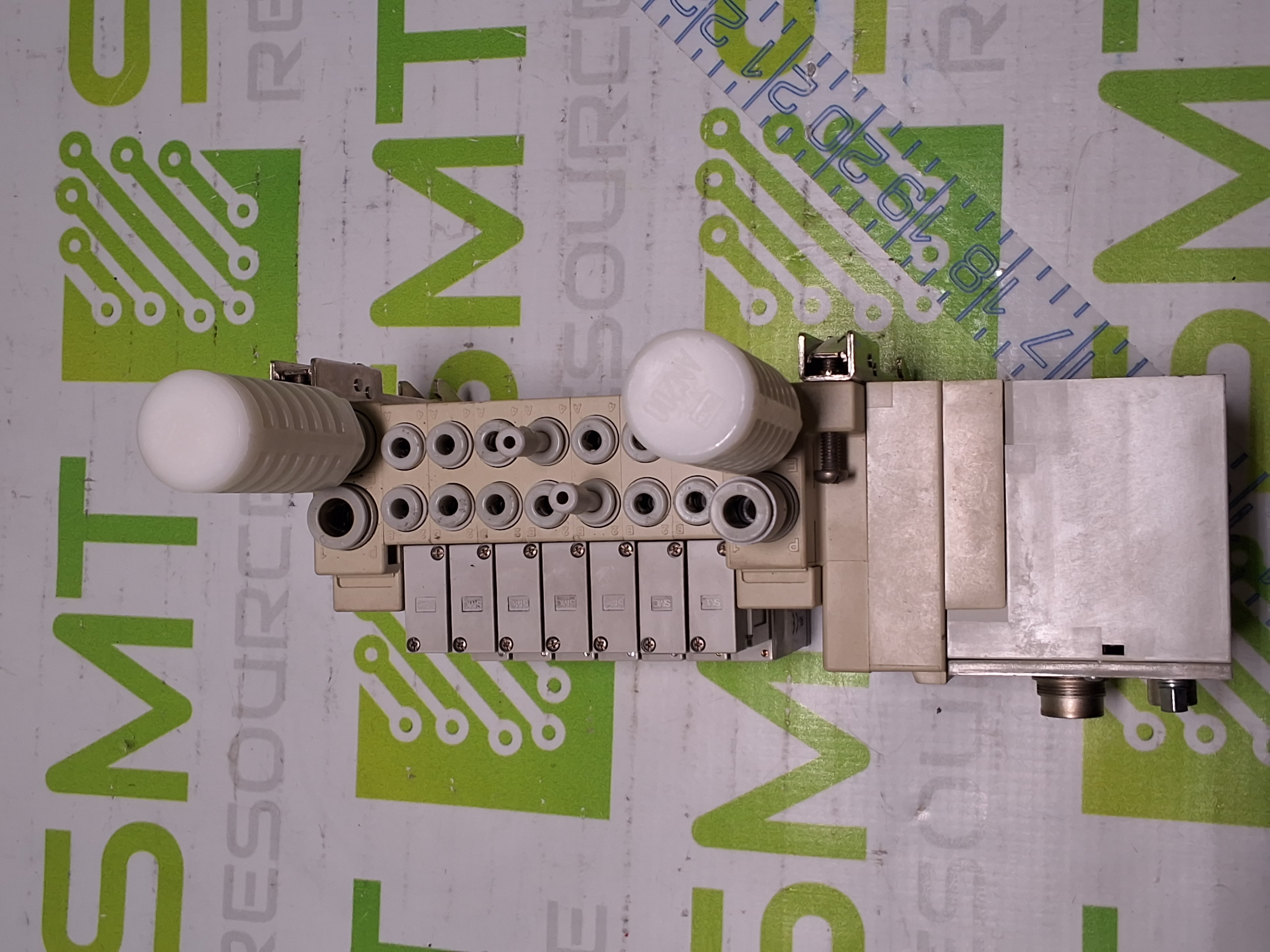 Used SMC EX120-SCA1 CONTROLLER AND 5 PORT MANIFOLD WITH 7 SMC SOLENOID VALVES