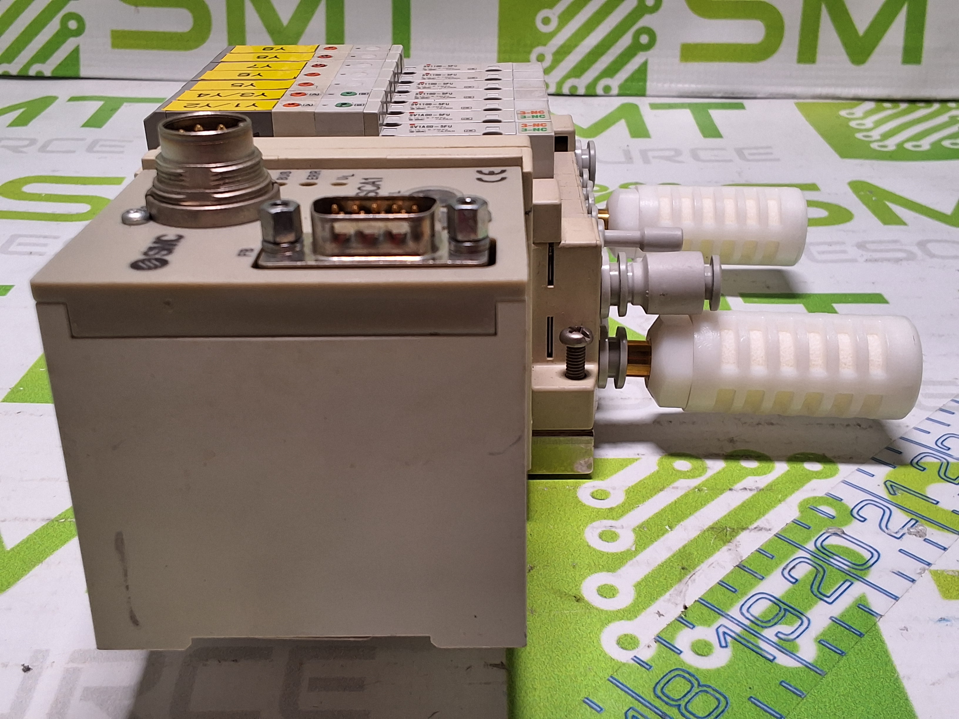 Used SMC EX120-SCA1 CONTROLLER AND 5 PORT MANIFOLD WITH 7 SMC SOLENOID VALVES